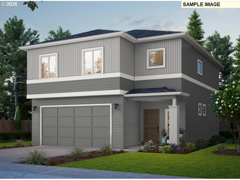 733 North Russet Place, Unit 193 Ridgefield, WA 98642 - Photo 1 of 34 a front view of a house with a yard and garage