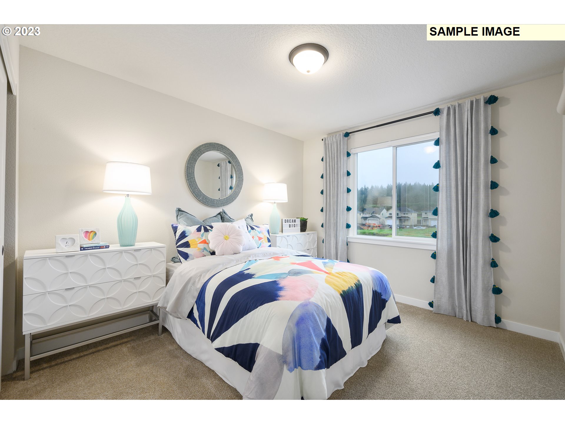 733 North Russet Place, Unit 193 Ridgefield, WA 98642 - Photo 19 of 34 a bed room with a bed and a large window