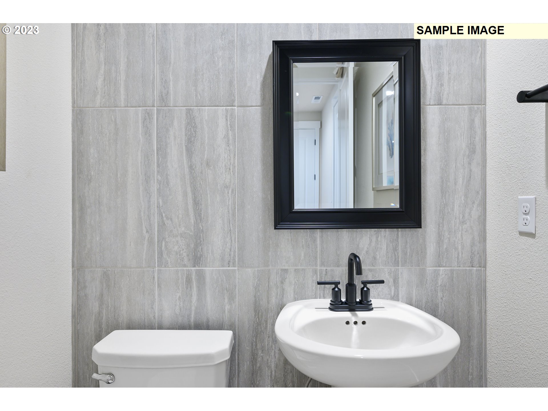 733 North Russet Place, Unit 193 Ridgefield, WA 98642 - Photo 34 of 34 a bathroom with a toilet a sink and mirror