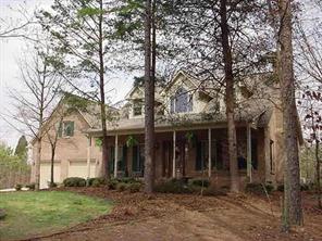 277 Battleground Road Kings Mountain, NC 28086 - Photo 1 of 8 a front view of a house with garden