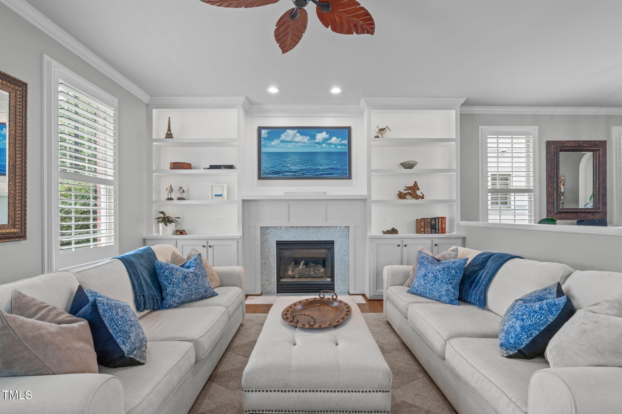 321 Commons Walk Circle Cary, NC 27519 - Photo 12 of 54 a living room with furniture and a fireplace