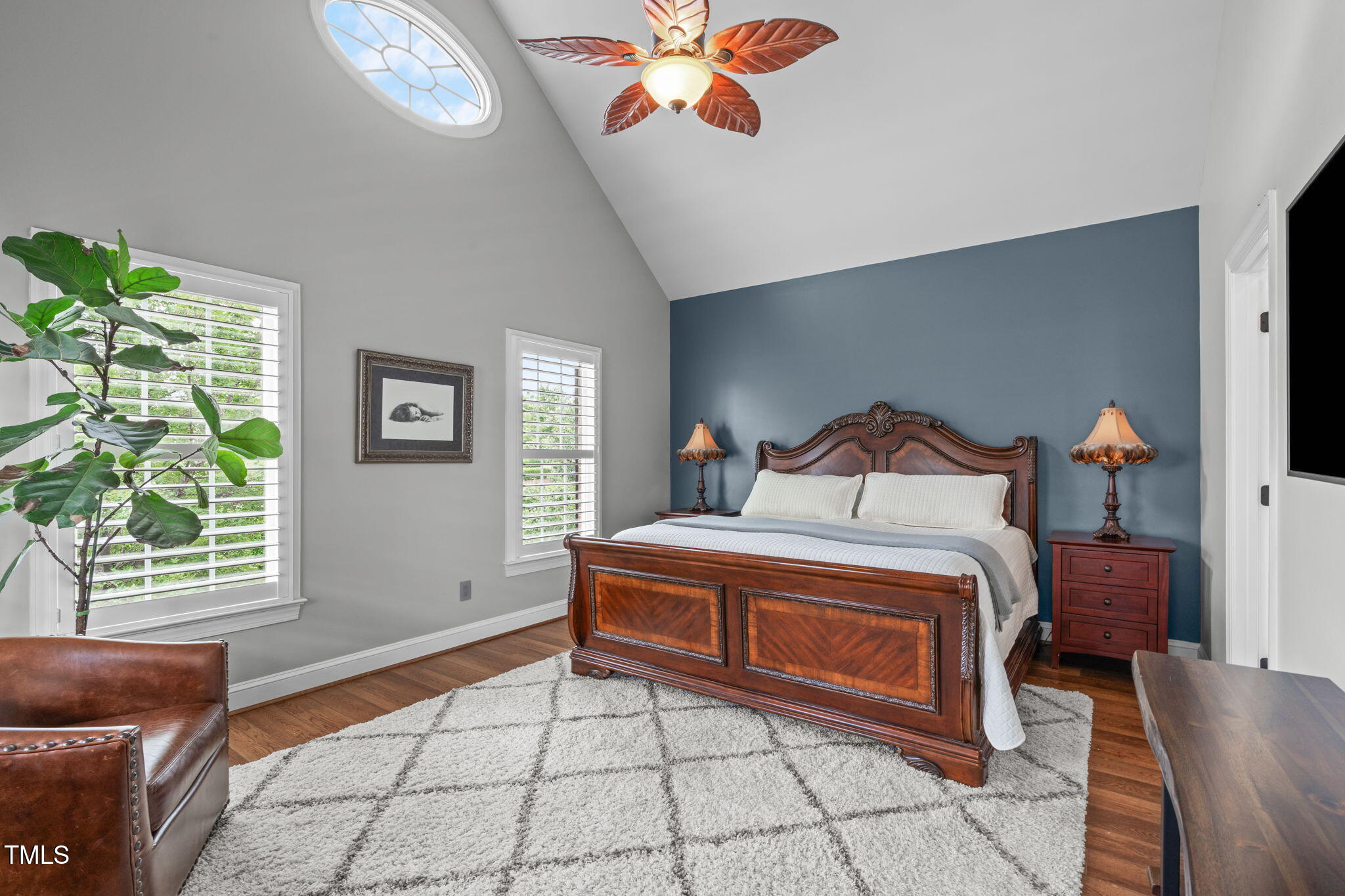 321 Commons Walk Circle Cary, NC 27519 - Photo 21 of 54 a bedroom with a bed and a window