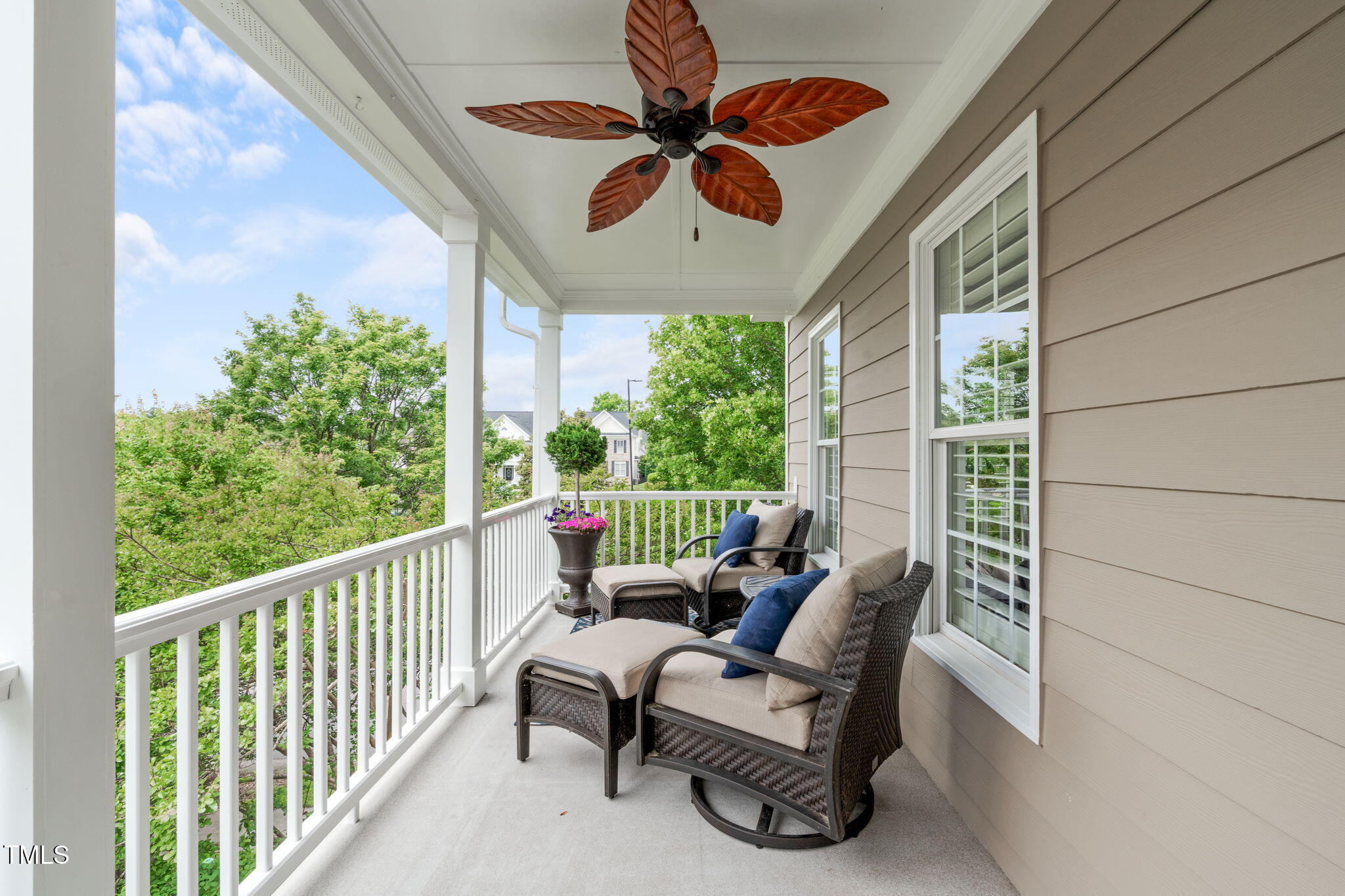 321 Commons Walk Circle Cary, NC 27519 - Photo 27 of 54 a view of a porch with furniture and a yard
