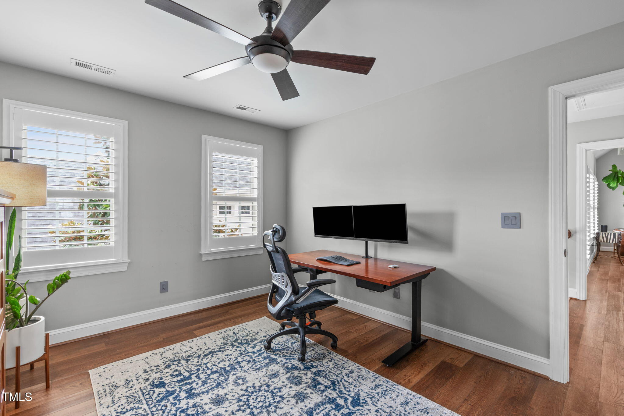321 Commons Walk Circle Cary, NC 27519 - Photo 36 of 54 a view of a workspace with furniture and a window