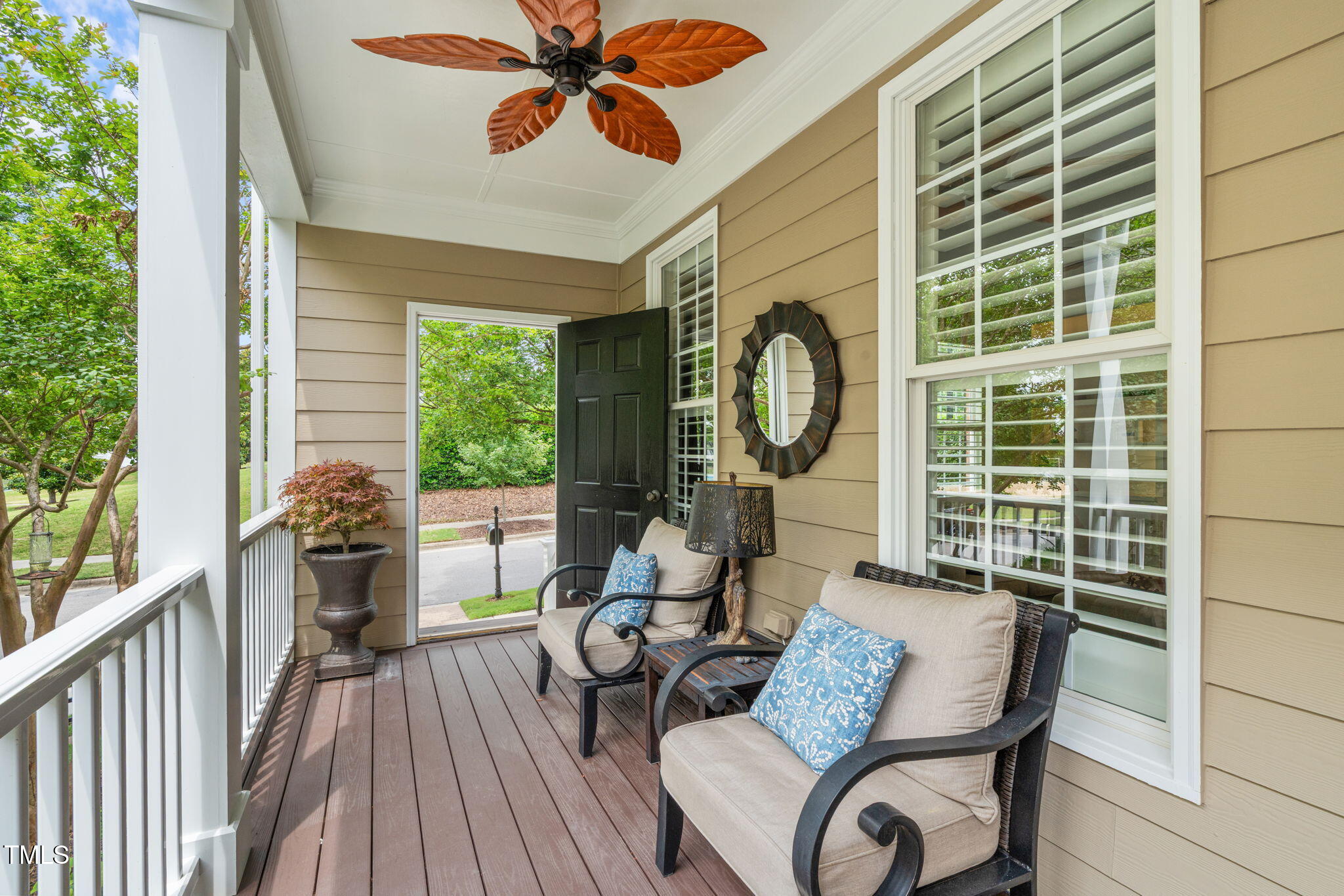 321 Commons Walk Circle Cary, NC 27519 - Photo 4 of 54 a view of a dining room with furniture window and wooden floor