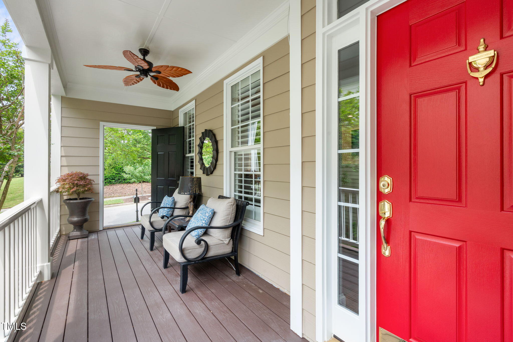 321 Commons Walk Circle Cary, NC 27519 - Photo 5 of 54 a living room with furniture and a large window