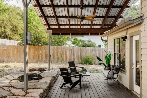 a view of balcony with patio