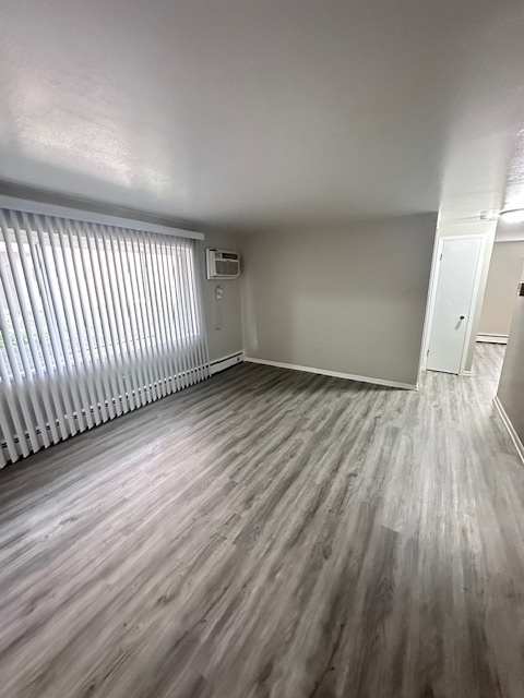 11655 South Pulaski Road, Unit 1B Alsip, IL 60803 - Photo 6 of 10 wooden floor in a hall with an entryway