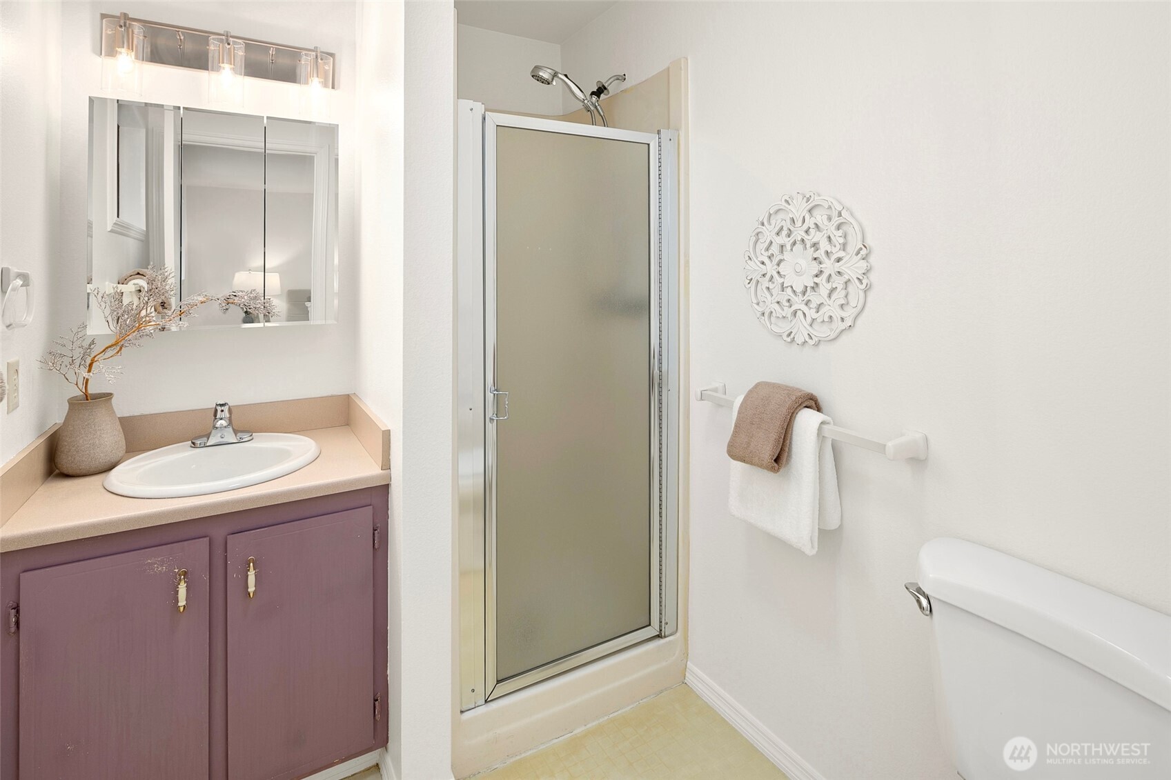 17612 Valley Cir Drive Bothell, WA 98012 - Photo 11 of 26 a bathroom with a sink and mirror