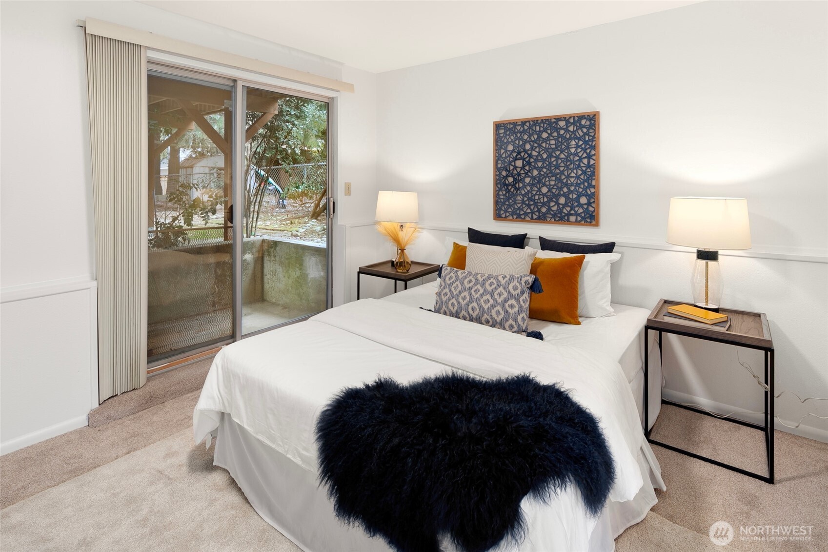 17612 Valley Cir Drive Bothell, WA 98012 - Photo 19 of 26 a bedroom with a bed and window