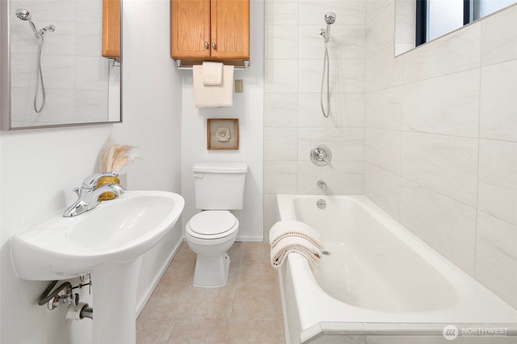 17612 Valley Cir Drive Bothell, WA 98012 - Photo 20 of 26 a bathroom with a sink a toilet and bathtub