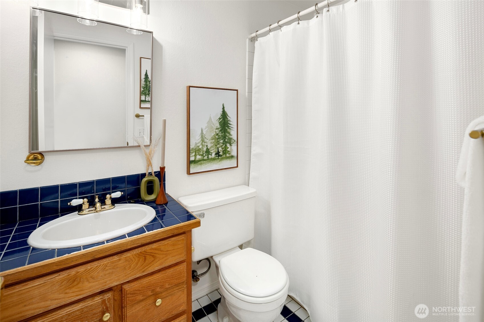 17612 Valley Cir Drive Bothell, WA 98012 - Photo 21 of 26 a bathroom with a granite countertop sink mirror vanity and toilet