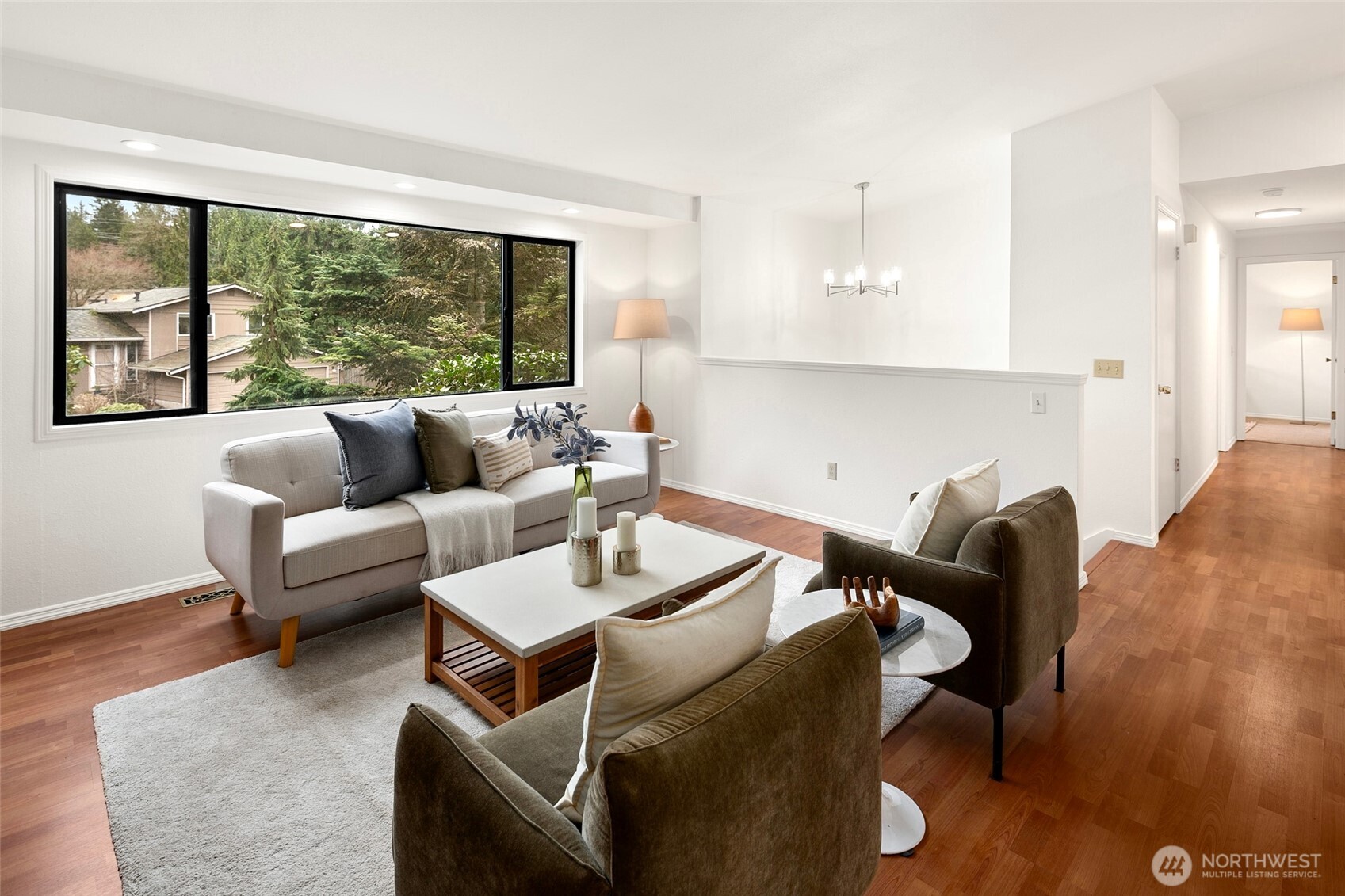 17612 Valley Cir Drive Bothell, WA 98012 - Photo 3 of 26 a living room with furniture and a large window