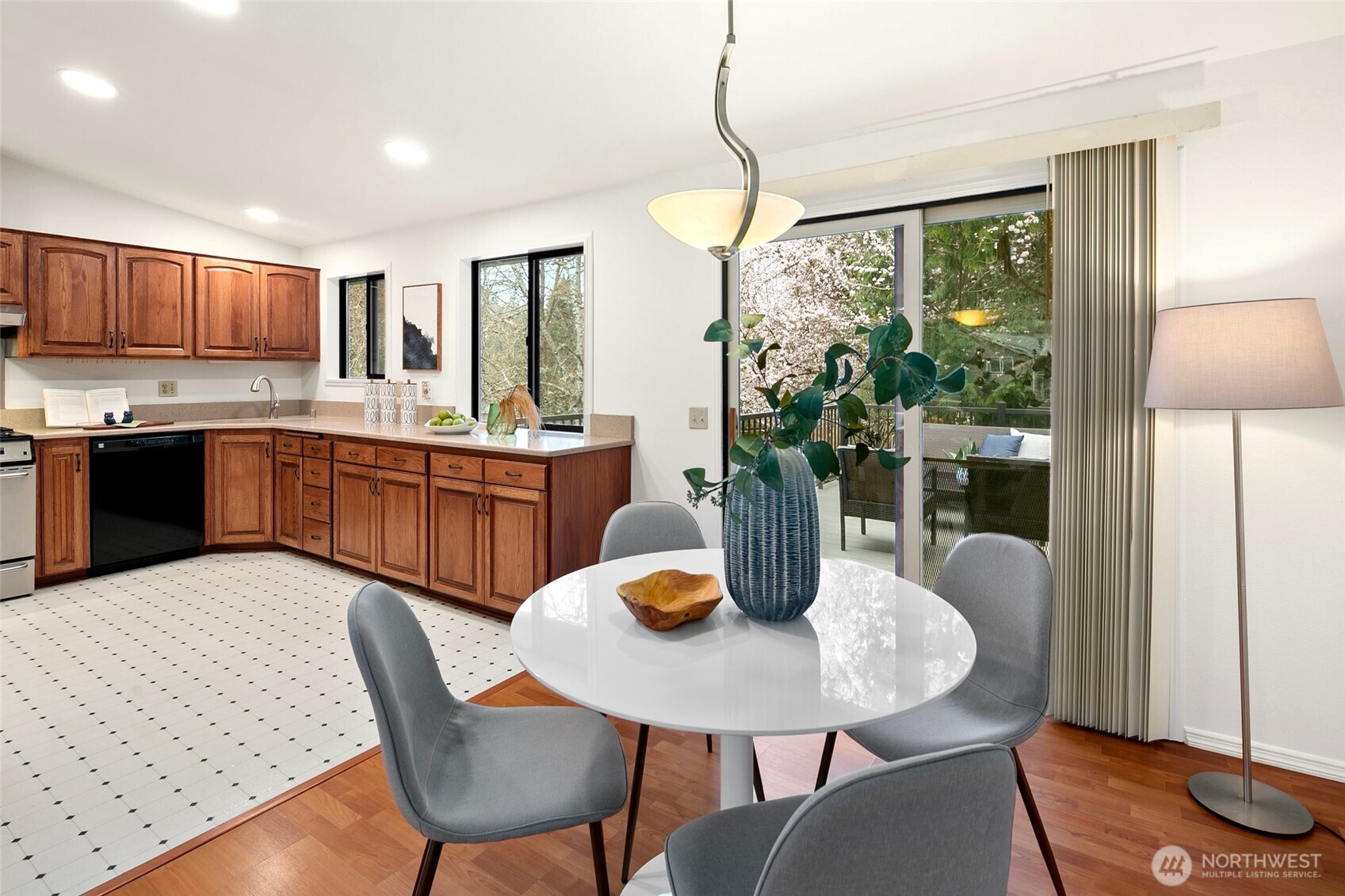 17612 Valley Cir Drive Bothell, WA 98012 - Photo 6 of 26 a view of a dining room with furniture window and wooden floor