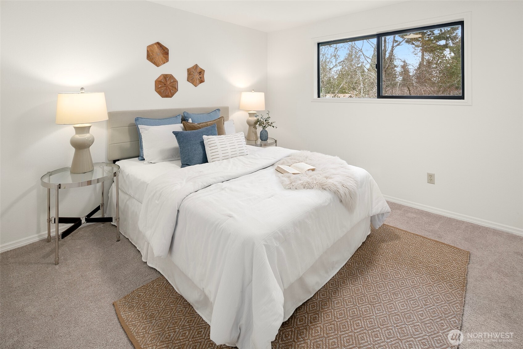 17612 Valley Cir Drive Bothell, WA 98012 - Photo 9 of 26 a bedroom with a bed and wall painting