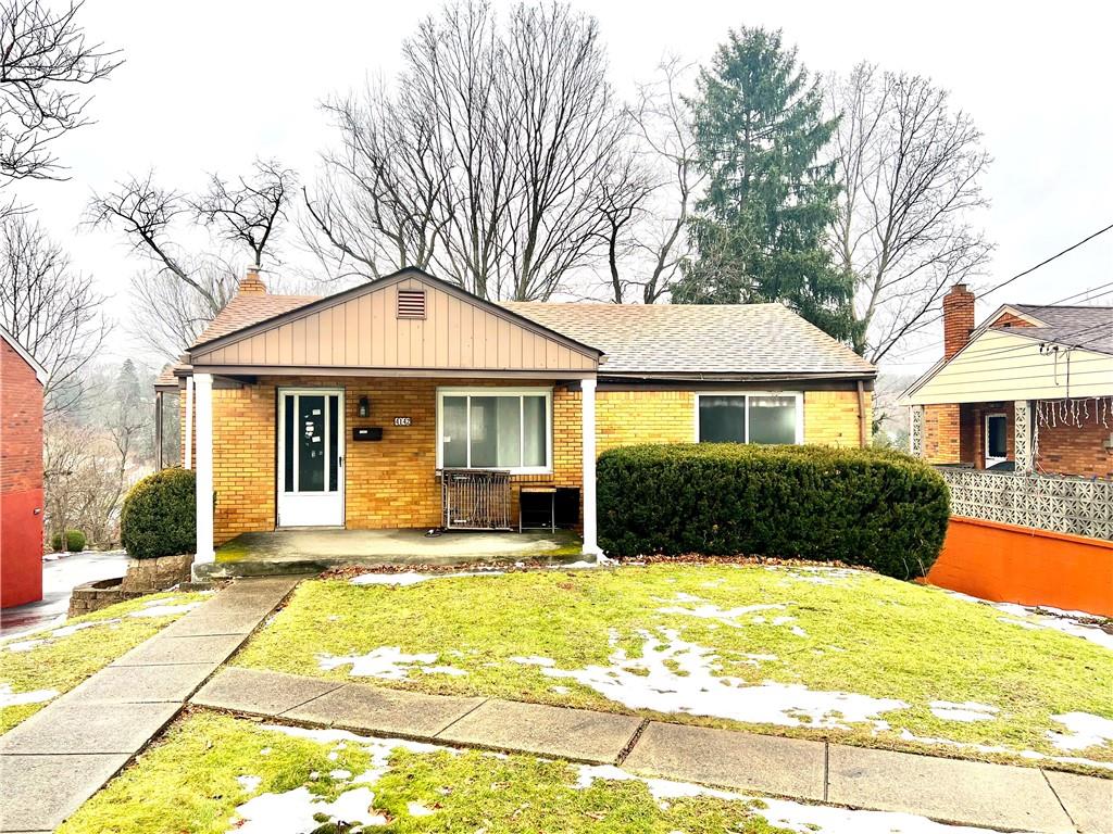 4142 Steiger Street Pittsburgh, PA 15234 - Photo 1 of 18 a front view of a house with a yard