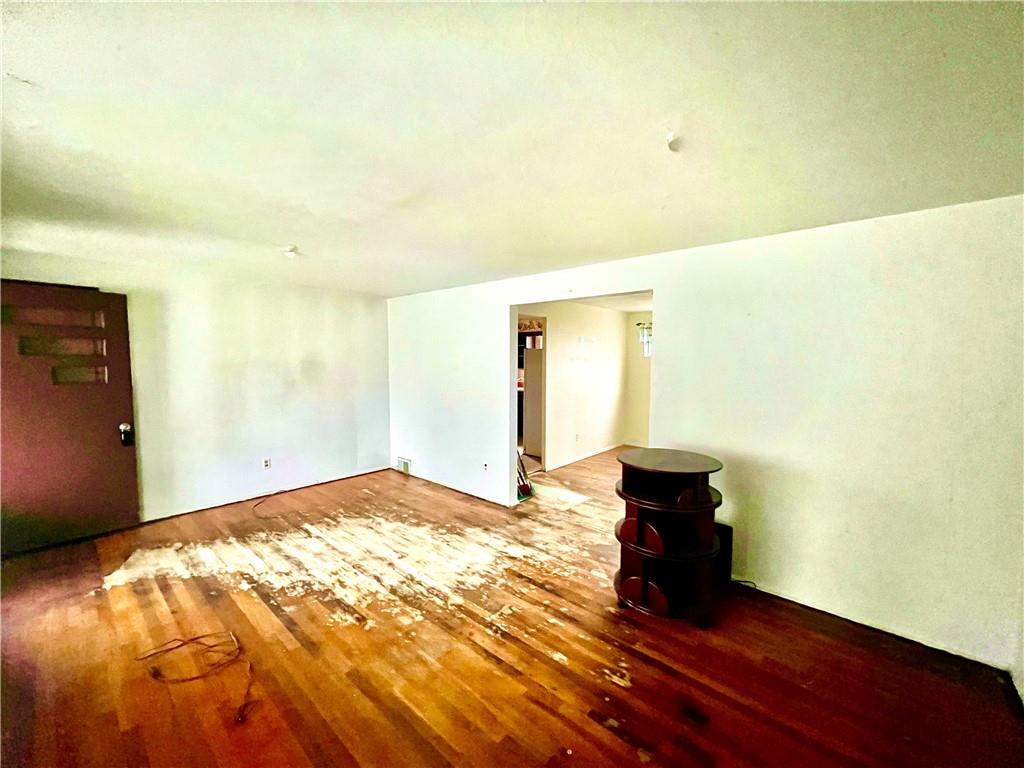 4142 Steiger Street Pittsburgh, PA 15234 - Photo 3 of 18 a view of empty room with wooden floor