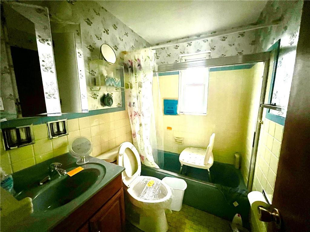 4142 Steiger Street Pittsburgh, PA 15234 - Photo 5 of 18 a bathroom with a sink toilet and shower