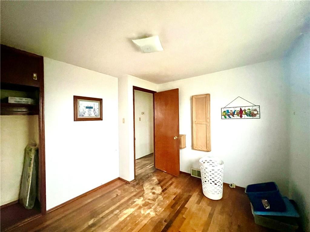4142 Steiger Street Pittsburgh, PA 15234 - Photo 7 of 18 a view of empty room with wooden floor