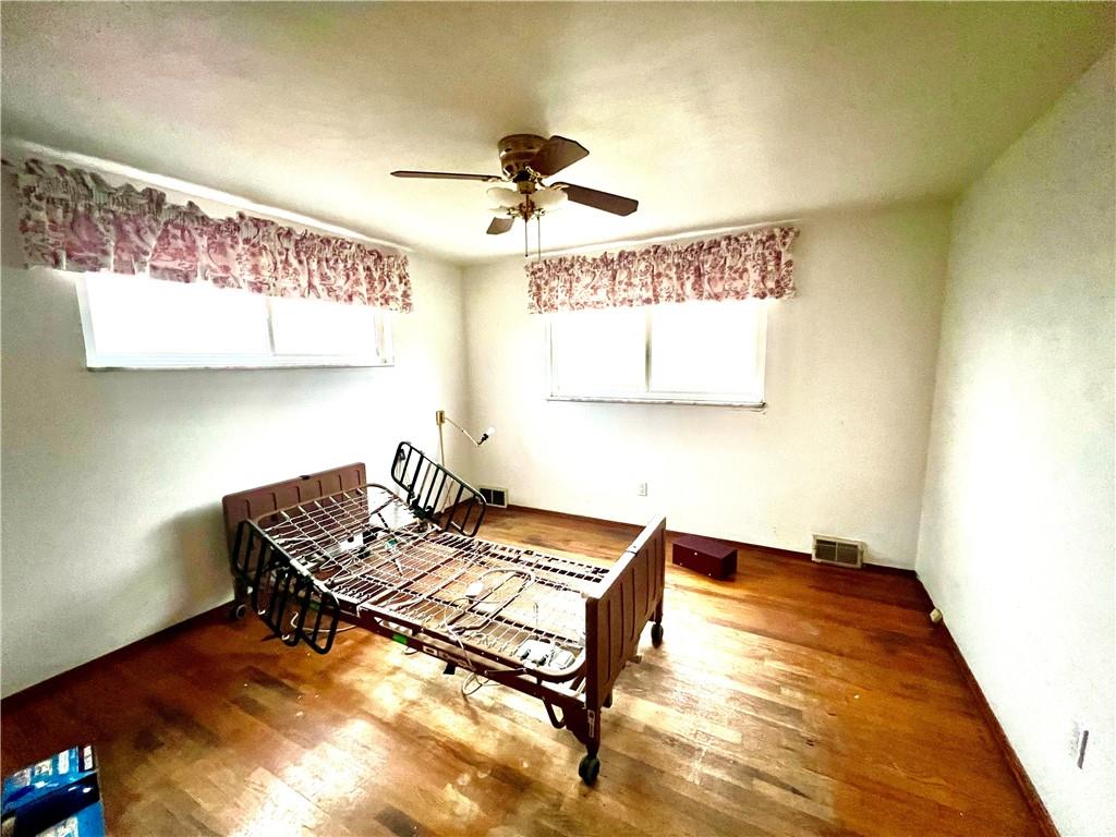 4142 Steiger Street Pittsburgh, PA 15234 - Photo 8 of 18 a living room with a rug
