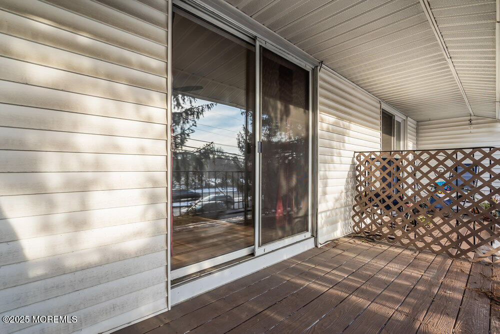 3403 Bridge Avenue, Unit 13 Point Pleasant, NJ 08742 - Photo 17 of 27 a view of a porch