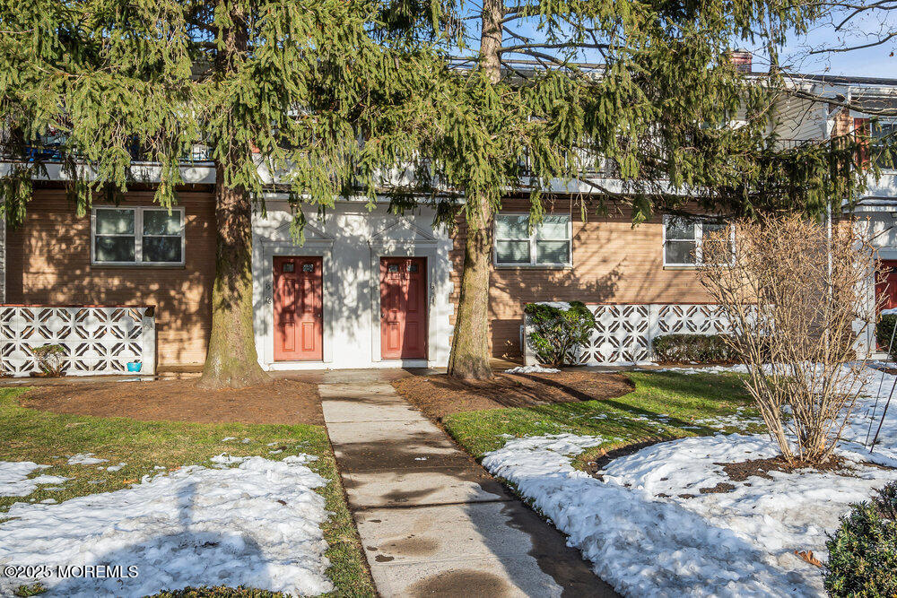 3403 Bridge Avenue, Unit 13 Point Pleasant, NJ 08742 - Photo 22 of 27 a view of a yard in front of a house