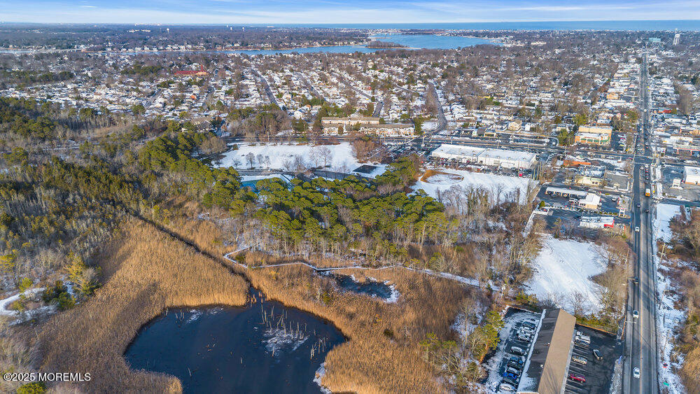 3403 Bridge Avenue, Unit 13 Point Pleasant, NJ 08742 - Photo 25 of 27 an aerial view of multiple house