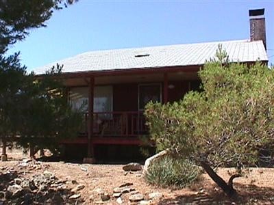 453 Canyon Road Pinon Hills, CA 92372 - Photo 1 of 1 a view of entryway front of house