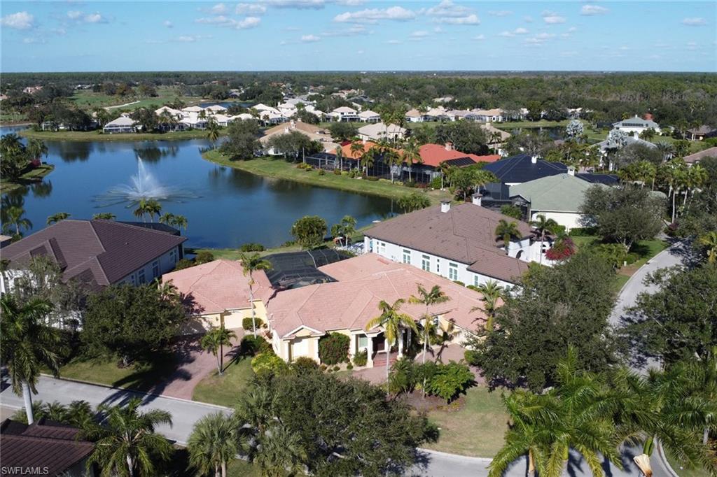 435 Terracina Way Naples, FL 34119 - Photo 47 of 50 Aerial perspective of suburban area featuring a nearby body of water