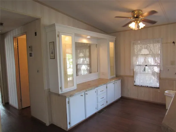 a kitchen with stainless steel appliances a refrigerator sink and stove