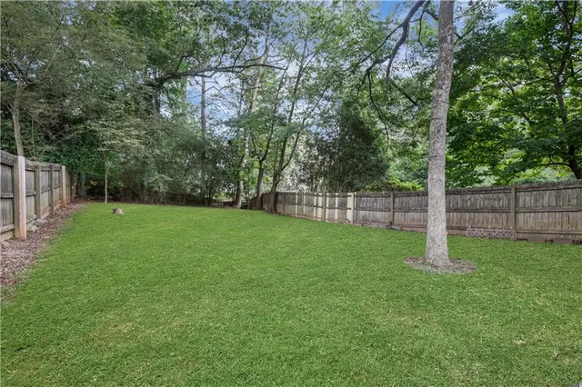 a house view with a garden space