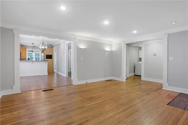 a view of a livingroom with wooden floor