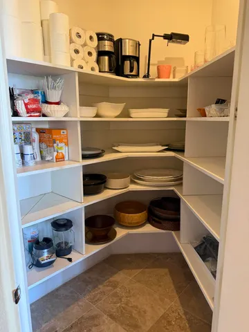 a spacious bathroom with a tub shower and sink