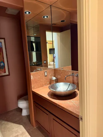 a bathroom with a shower and a toilet