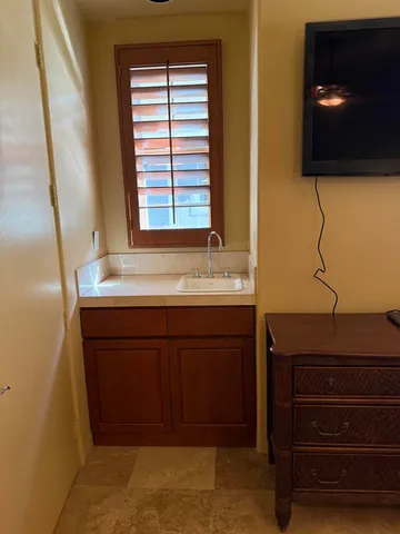 a view of a lake with a building in the background