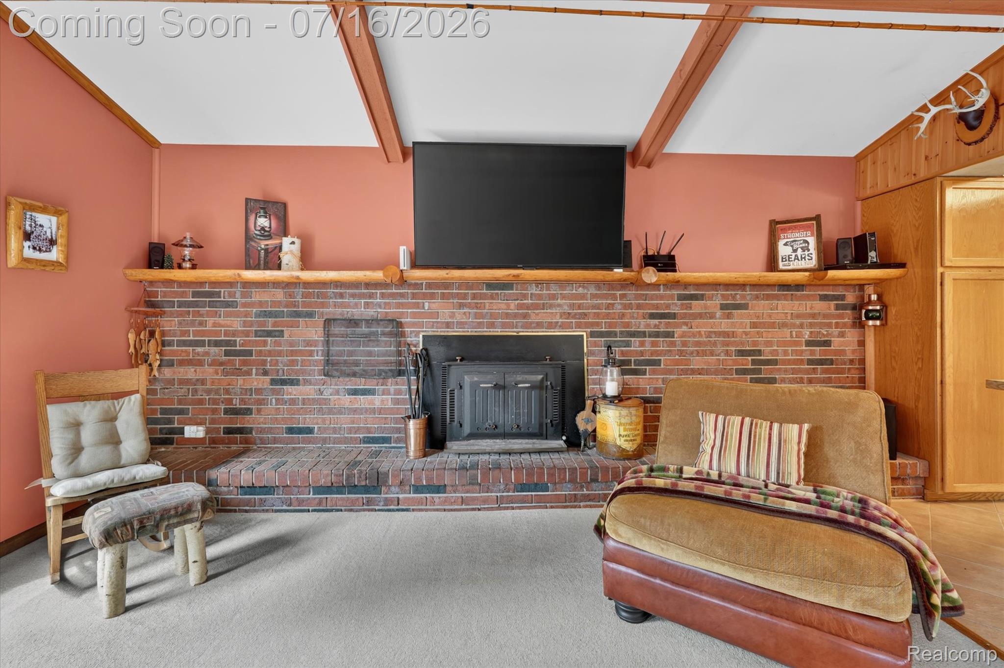 Brick fireplace with a wood-burning insert
