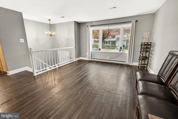 a view of entryway with wooden floor