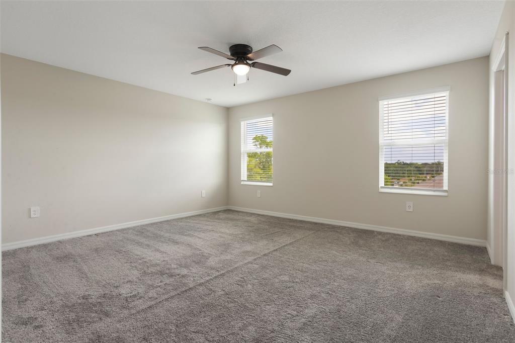 2932 Muller Oak Loop Ocoee, FL 34761 - Photo 16 of 32 a view of an empty room with a window
