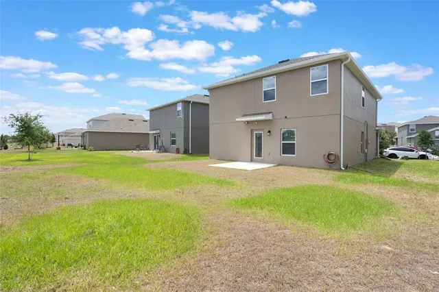 a house view with a outdoor space