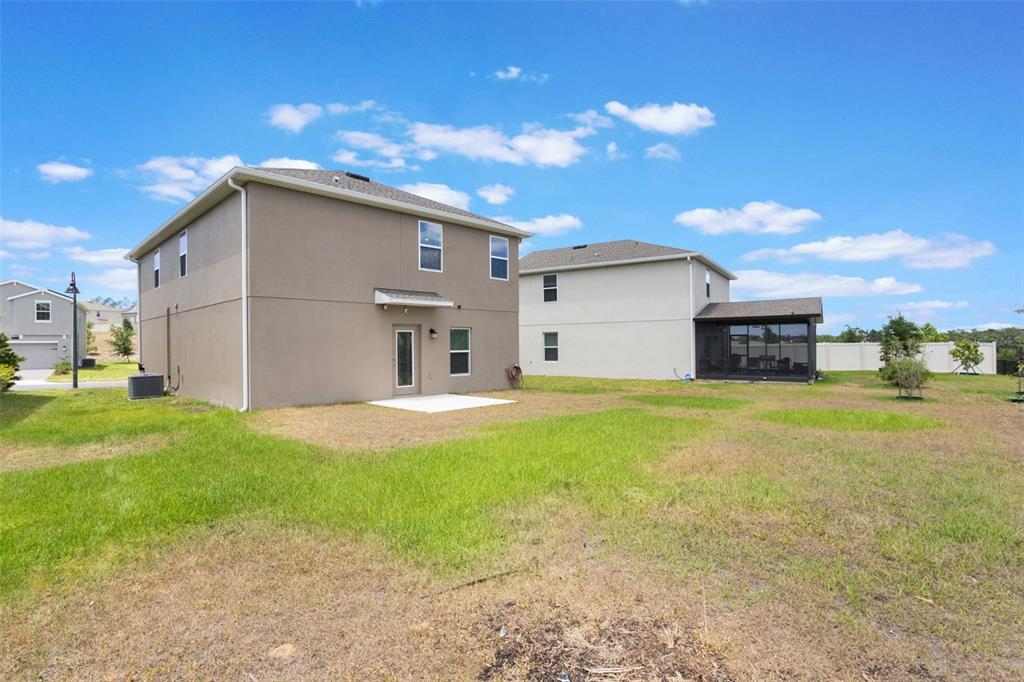 2932 Muller Oak Loop Ocoee, FL 34761 - Photo 32 of 32 a house view with a outdoor space