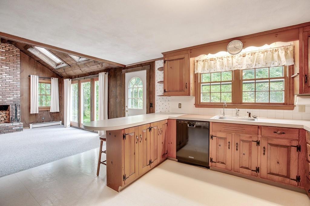 137 Depot Road Boxford, MA 01921 - Photo 5 of 18 a large kitchen with stainless steel appliances granite countertop a large window