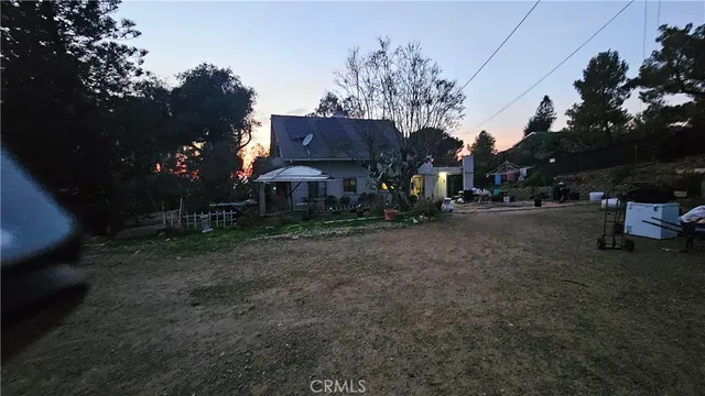 a view of street with parked cars