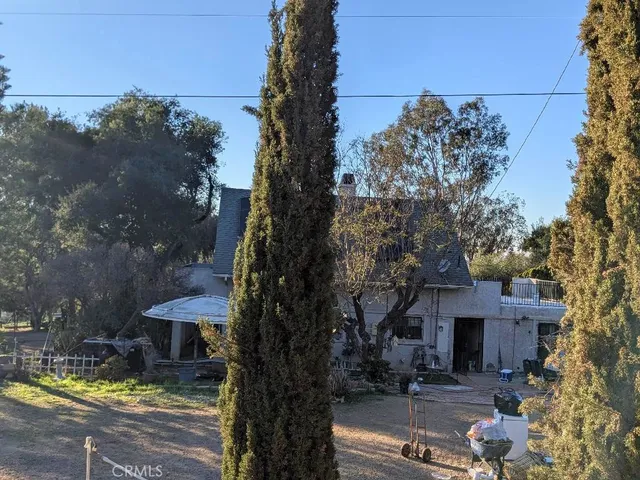 a view of a balcony with chairs