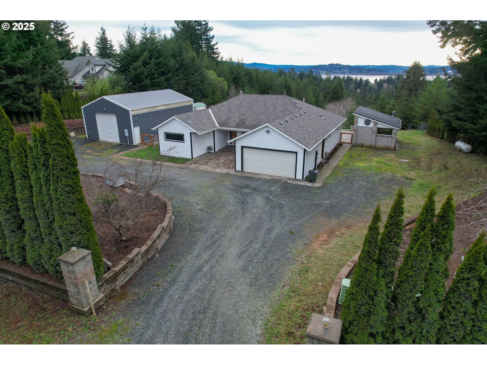 94088 Kirkendall Lane North Bend, OR 97459 - Photo 2 of 46 a aerial view of a house with a yard