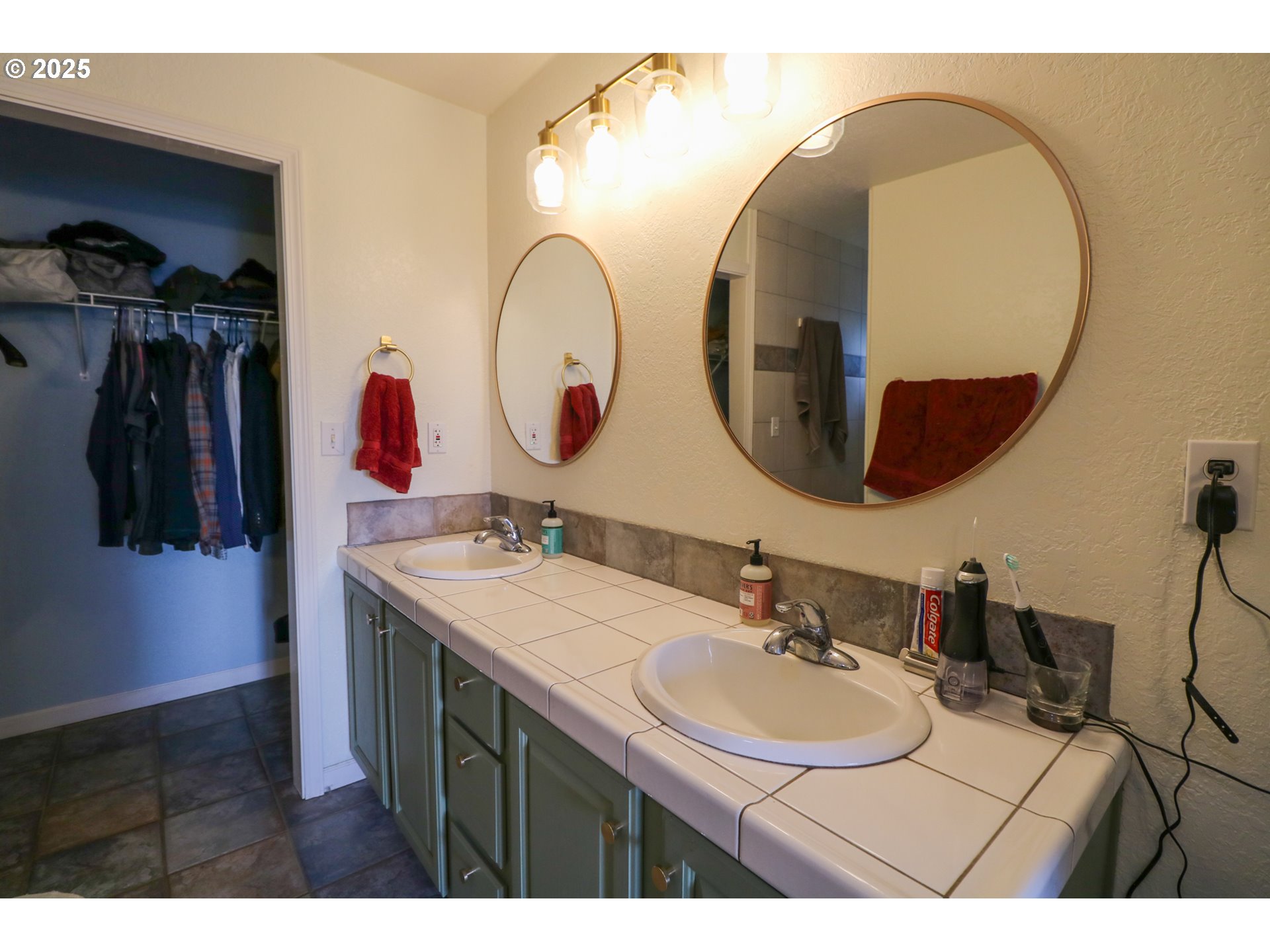 94088 Kirkendall Lane North Bend, OR 97459 - Photo 26 of 46 a bathroom with a sink and a mirror
