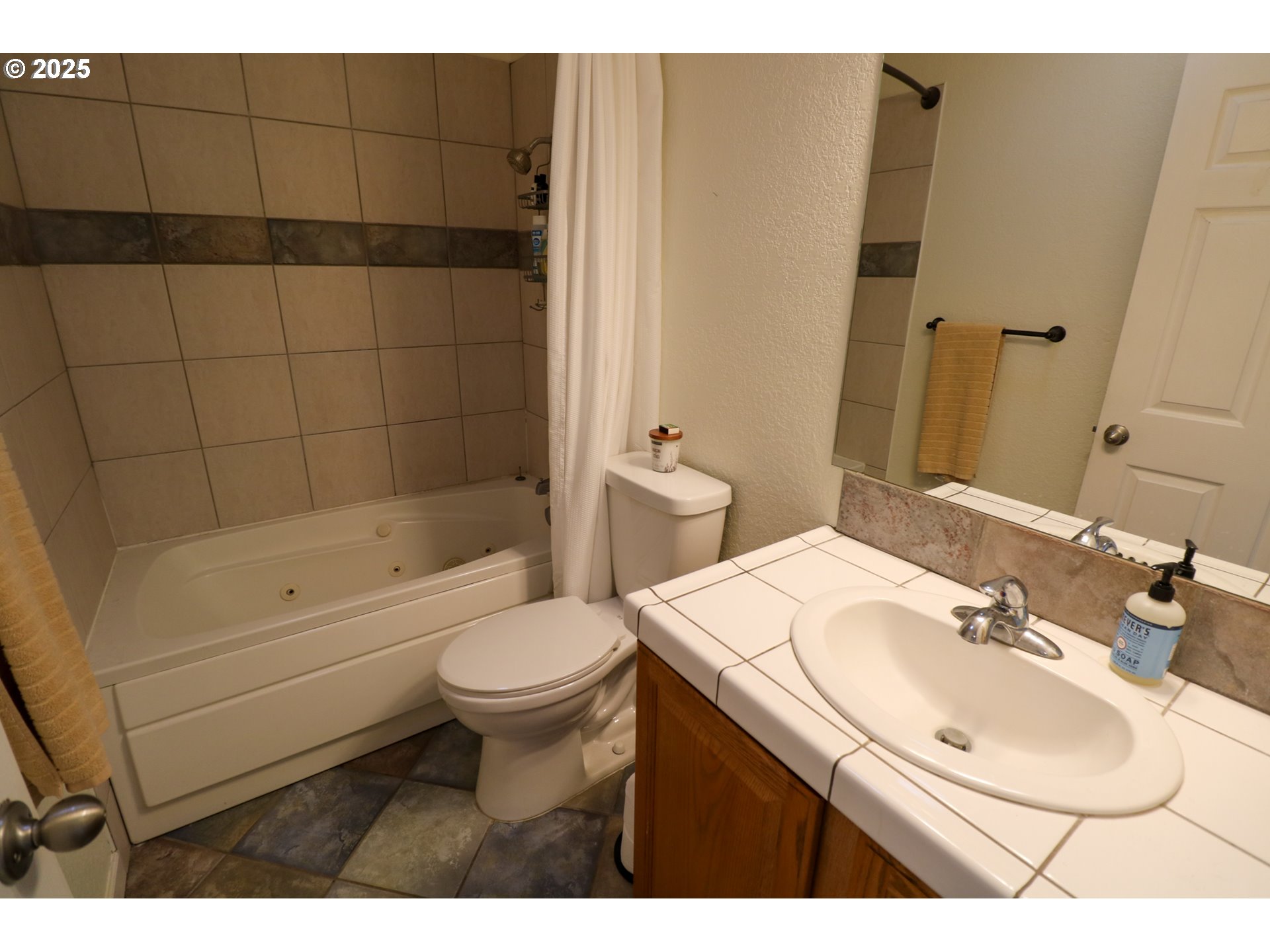 94088 Kirkendall Lane North Bend, OR 97459 - Photo 38 of 46 a bathroom with a sink toilet and shower