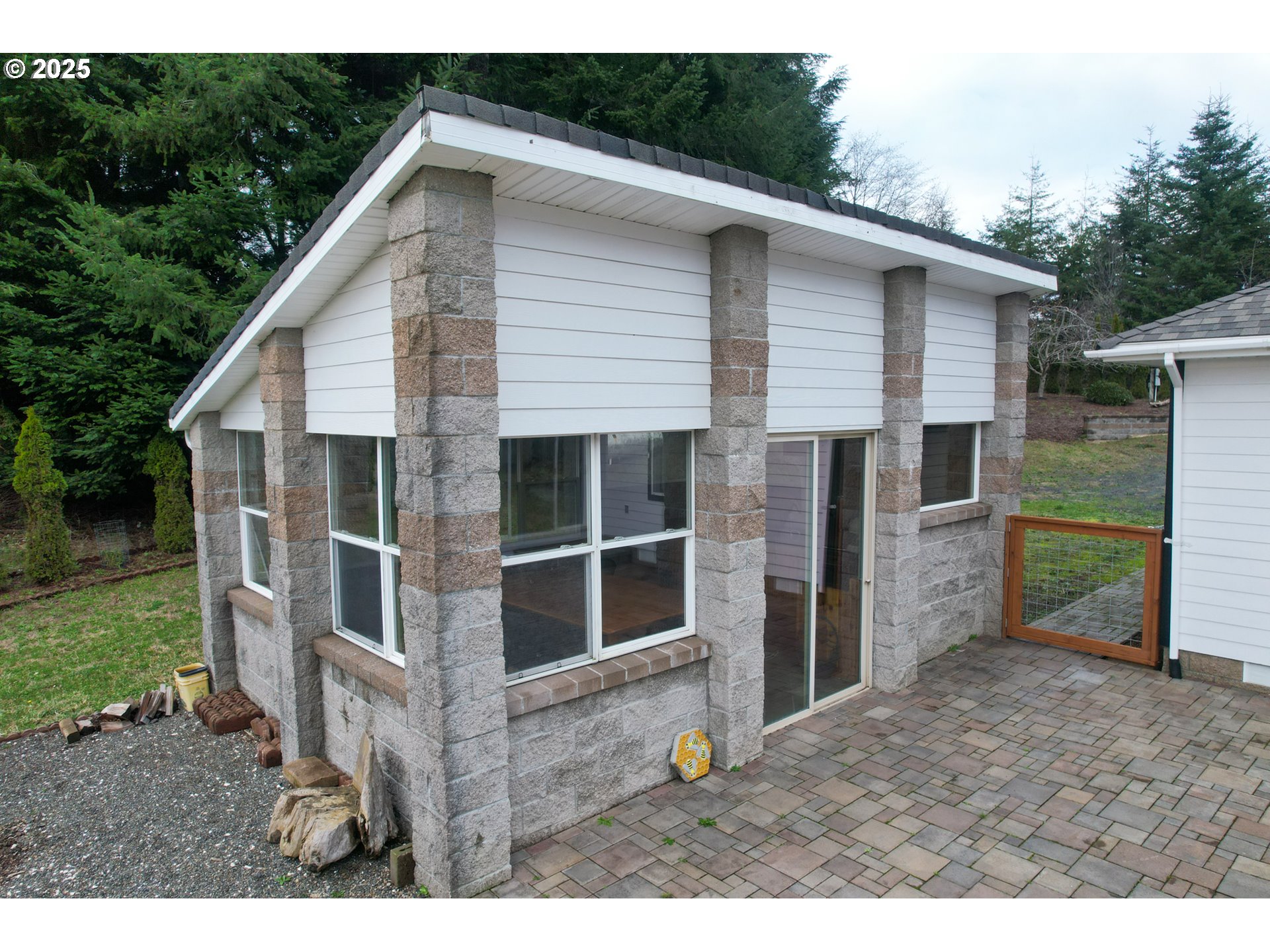 94088 Kirkendall Lane North Bend, OR 97459 - Photo 39 of 46 a view of house with backyard and garden