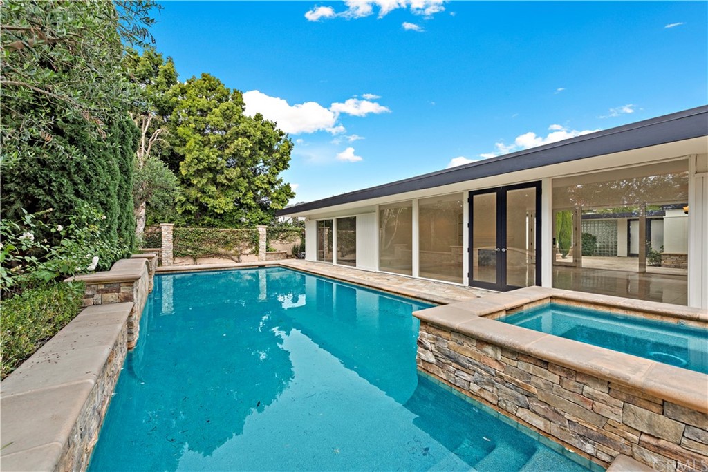 147 Monarch Bay Drive Dana Point, CA 92629 - Photo 2 of 16 a view of house with swimming pool outdoor seating
