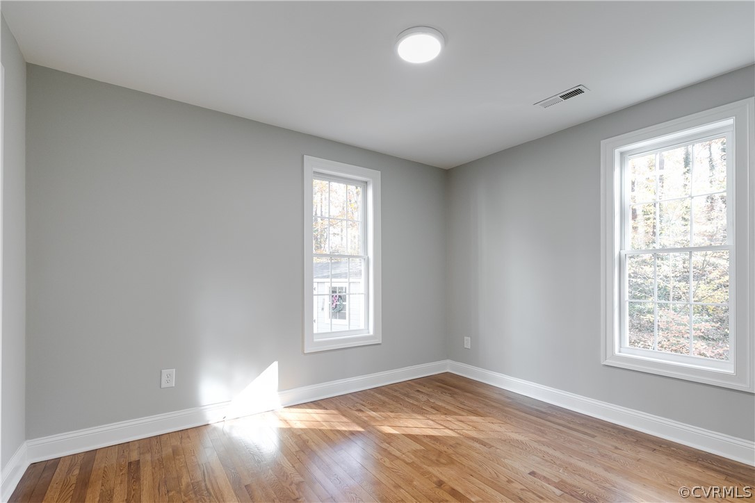 4907 Court Ridge Terrace Midlothian, VA 23112 - Photo 30 of 43 a view of empty room with wooden floor and fan