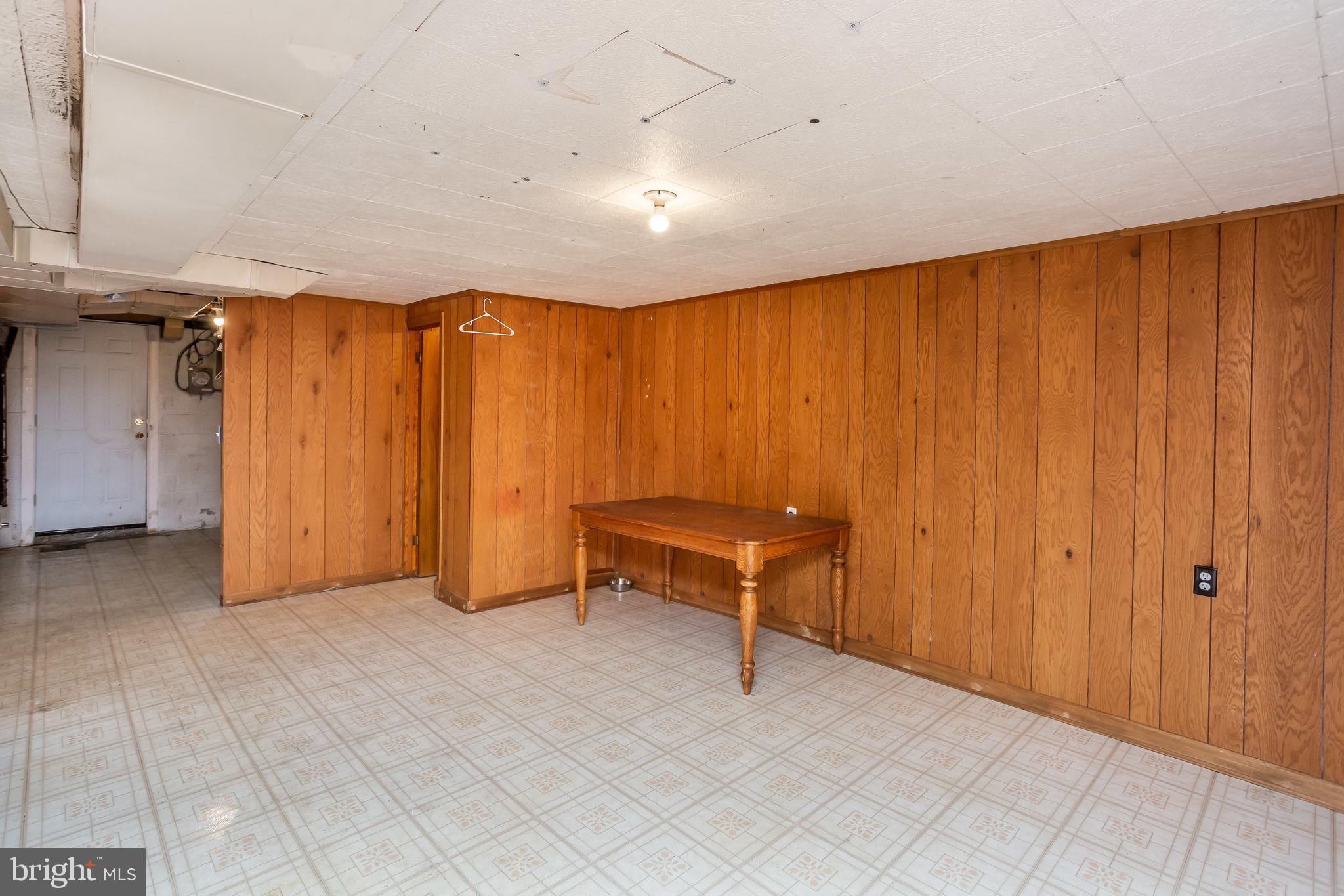 728 Aldworth Road Baltimore, MD 21222 - Photo 16 of 21 a view of a room with a table and a chair